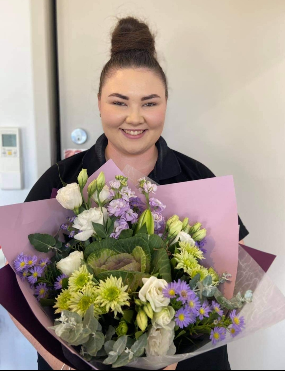 Ararat local email holding flowers to congratulate her on finishing Early Childhood Education and Care Diploma